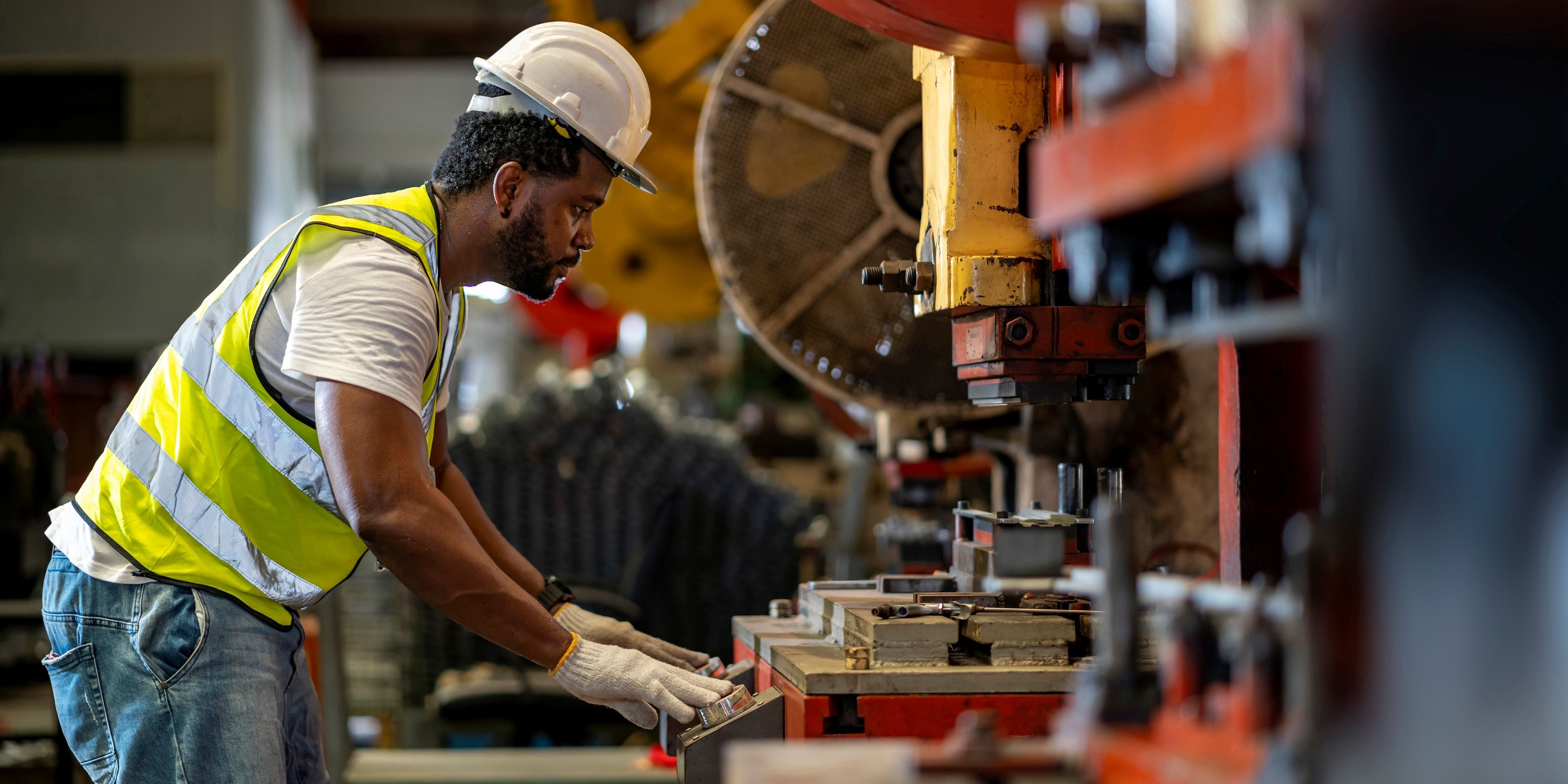 Man working on printing press