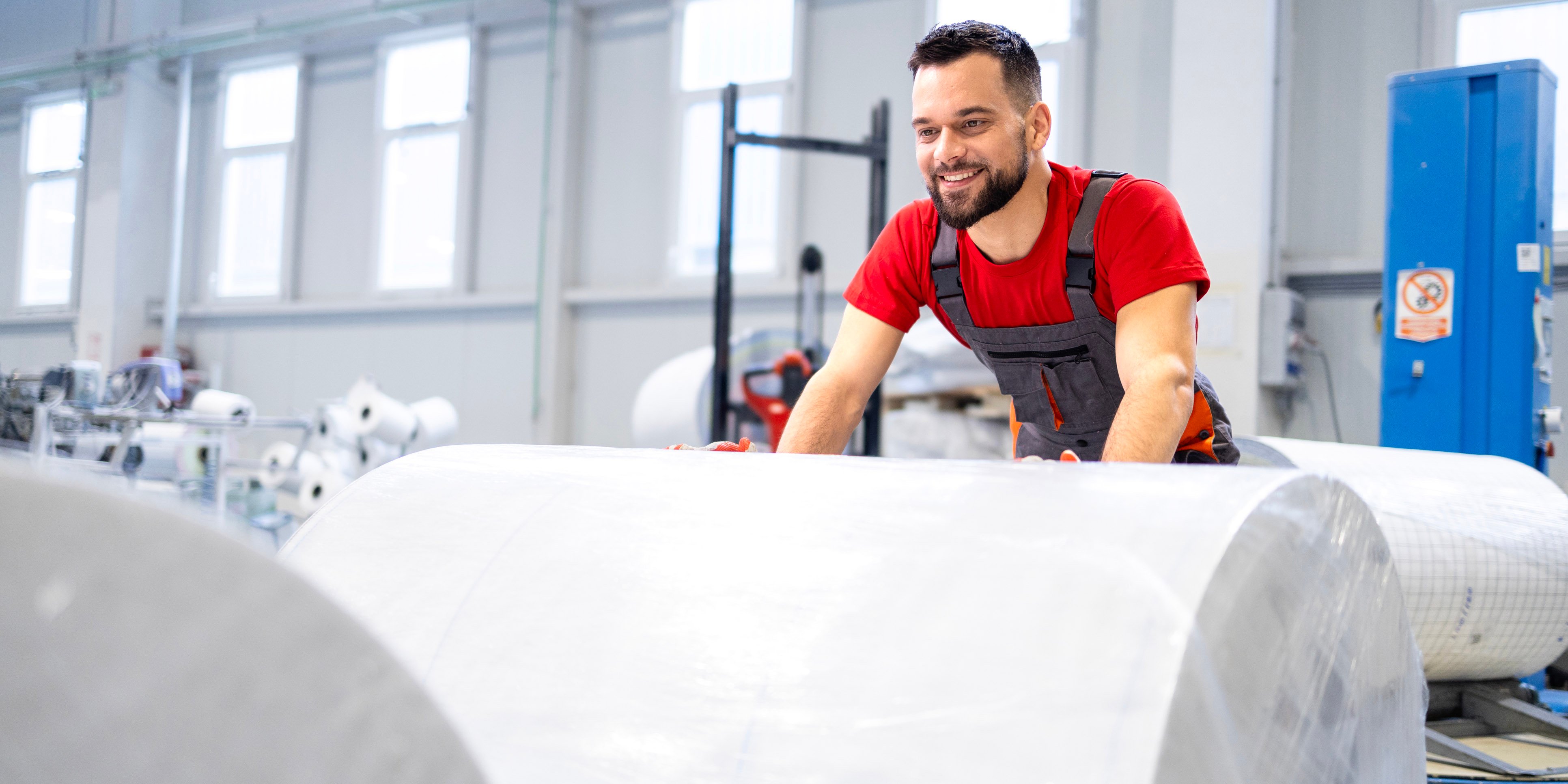 Worker in paper factory