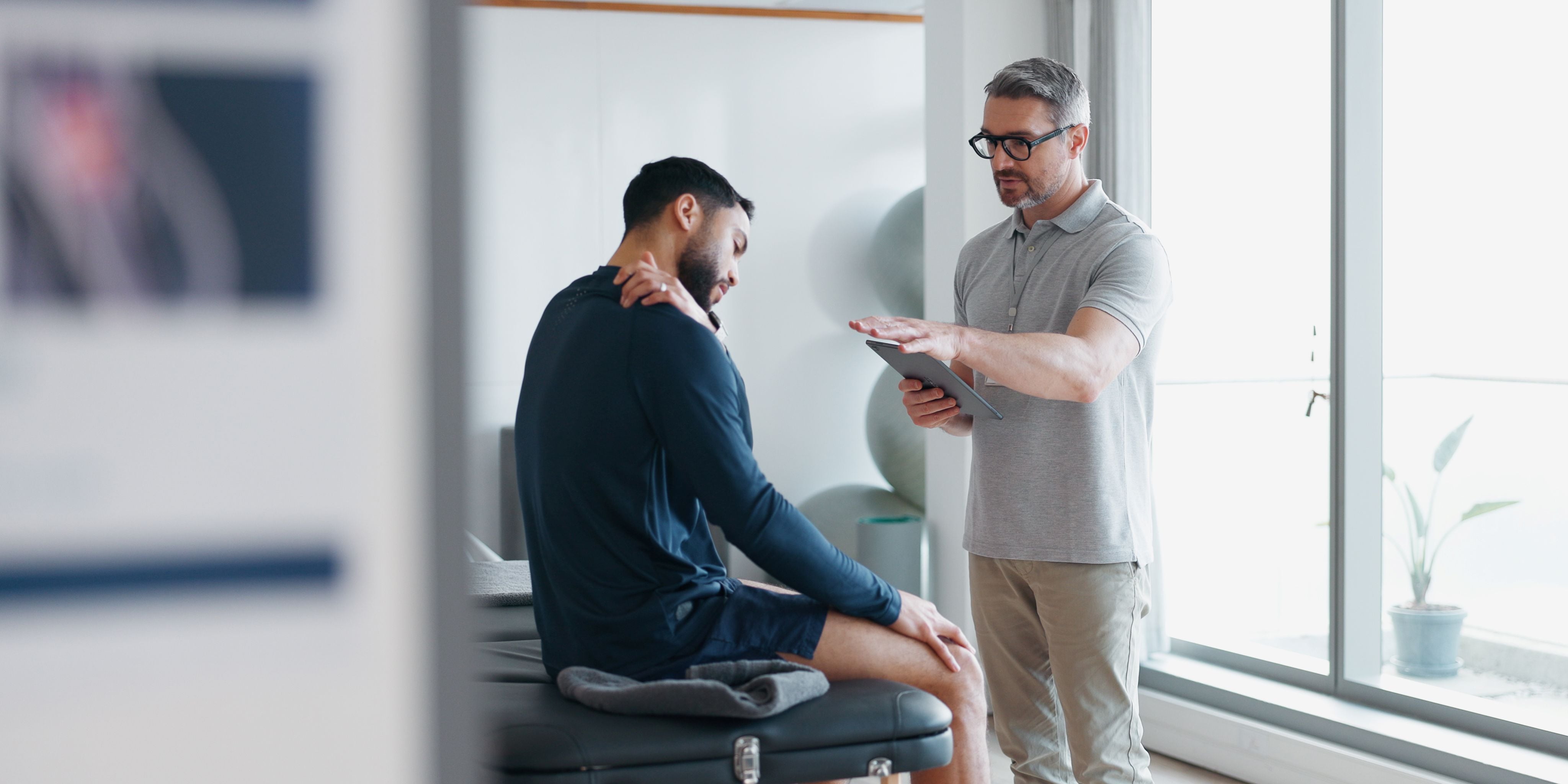 PT and Man with Sore Shoulder